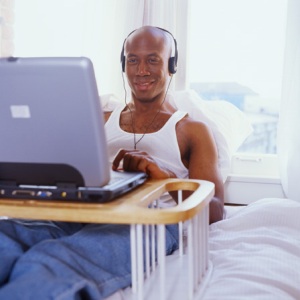 man_in_bed_on_computer.jpg